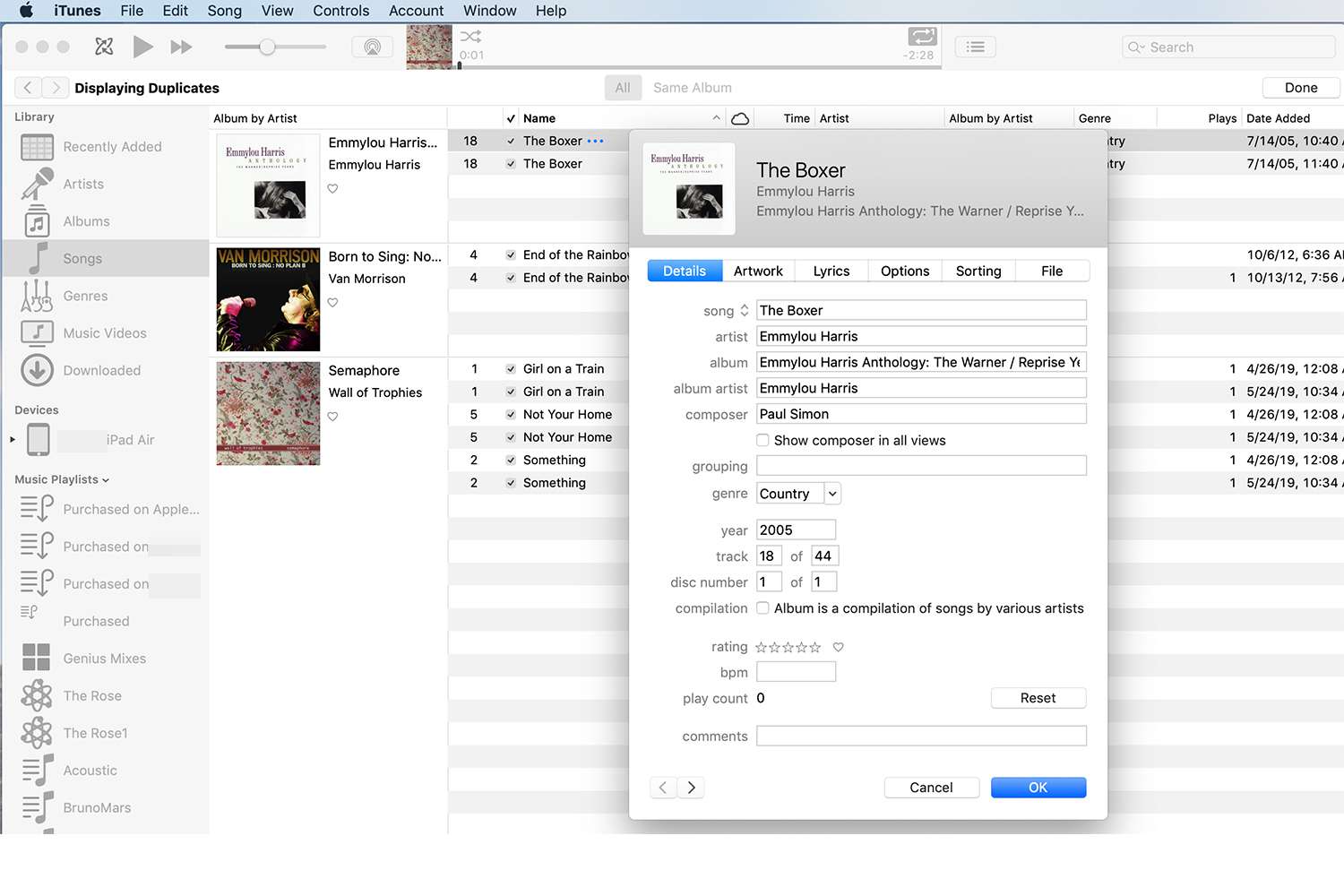 Visning av sånginformation i iTunes-dubbletter