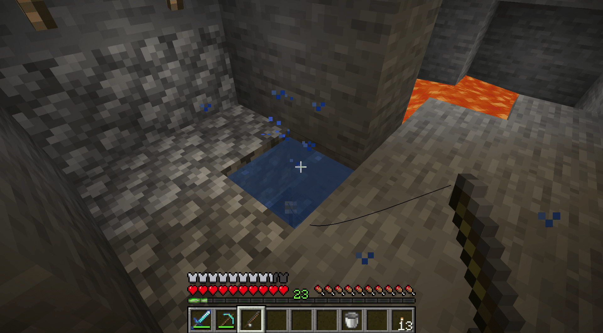 En skärmdump av att fånga en fisk i ett fiskehål i Minecraft.