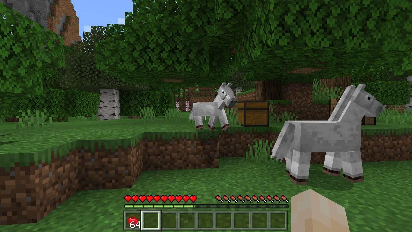 En vuxen häst och en babyhäst i Minecraft