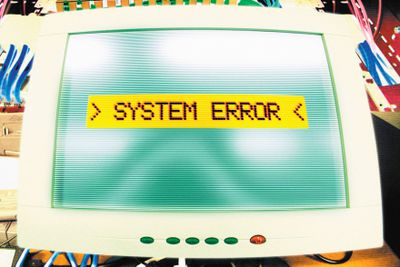 Bild på ett dator felmeddelande som säger System Error