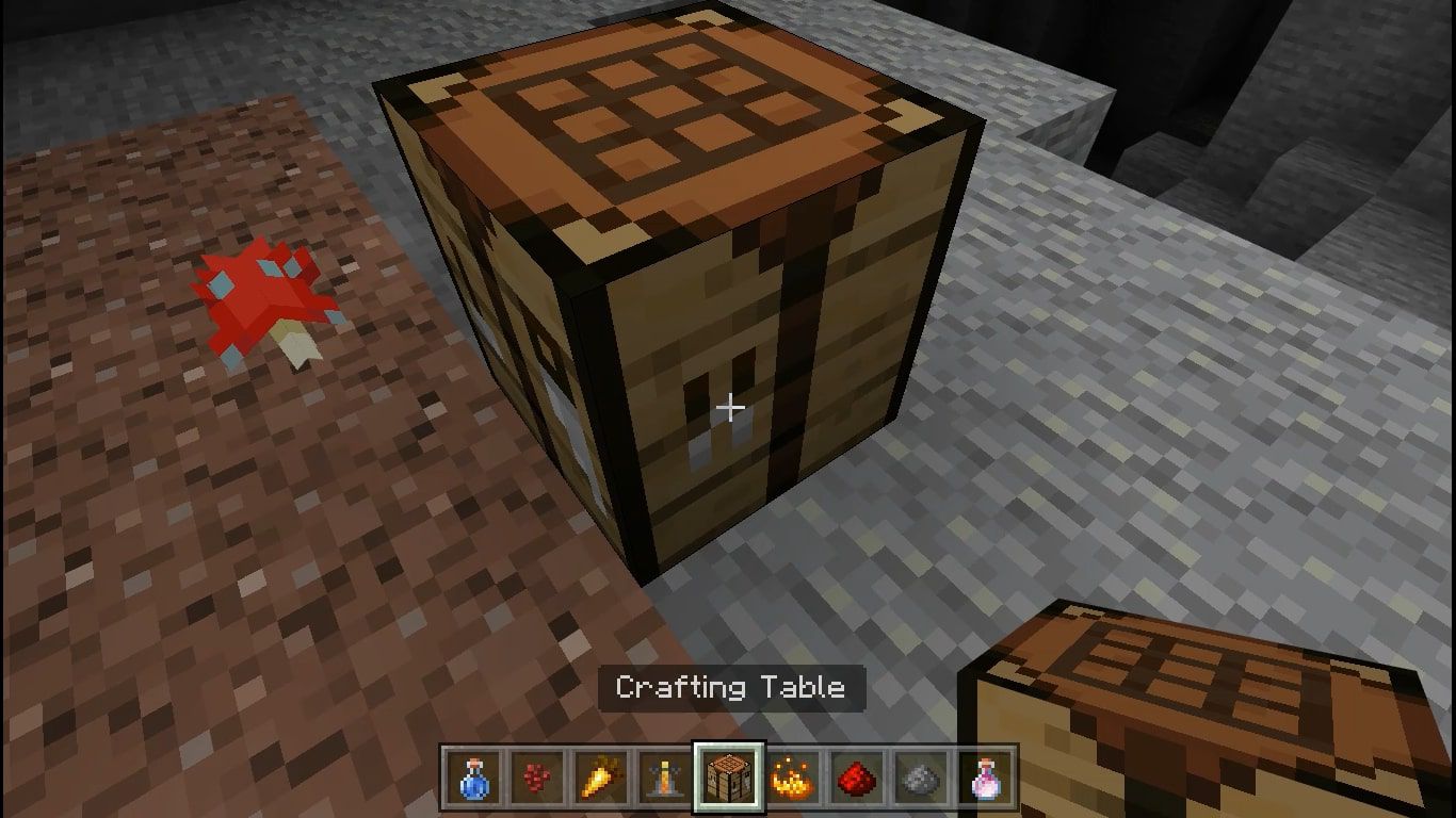 Placera ditt Crafting Table på marken och interagera med det för att få fram 3X3 crafting grid.