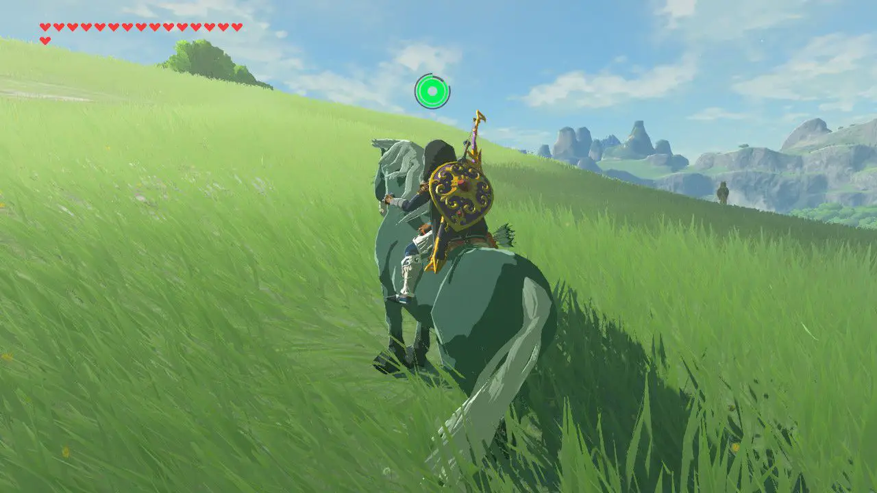 Lugnar en vild häst i Zelda: Breath of the Wild.