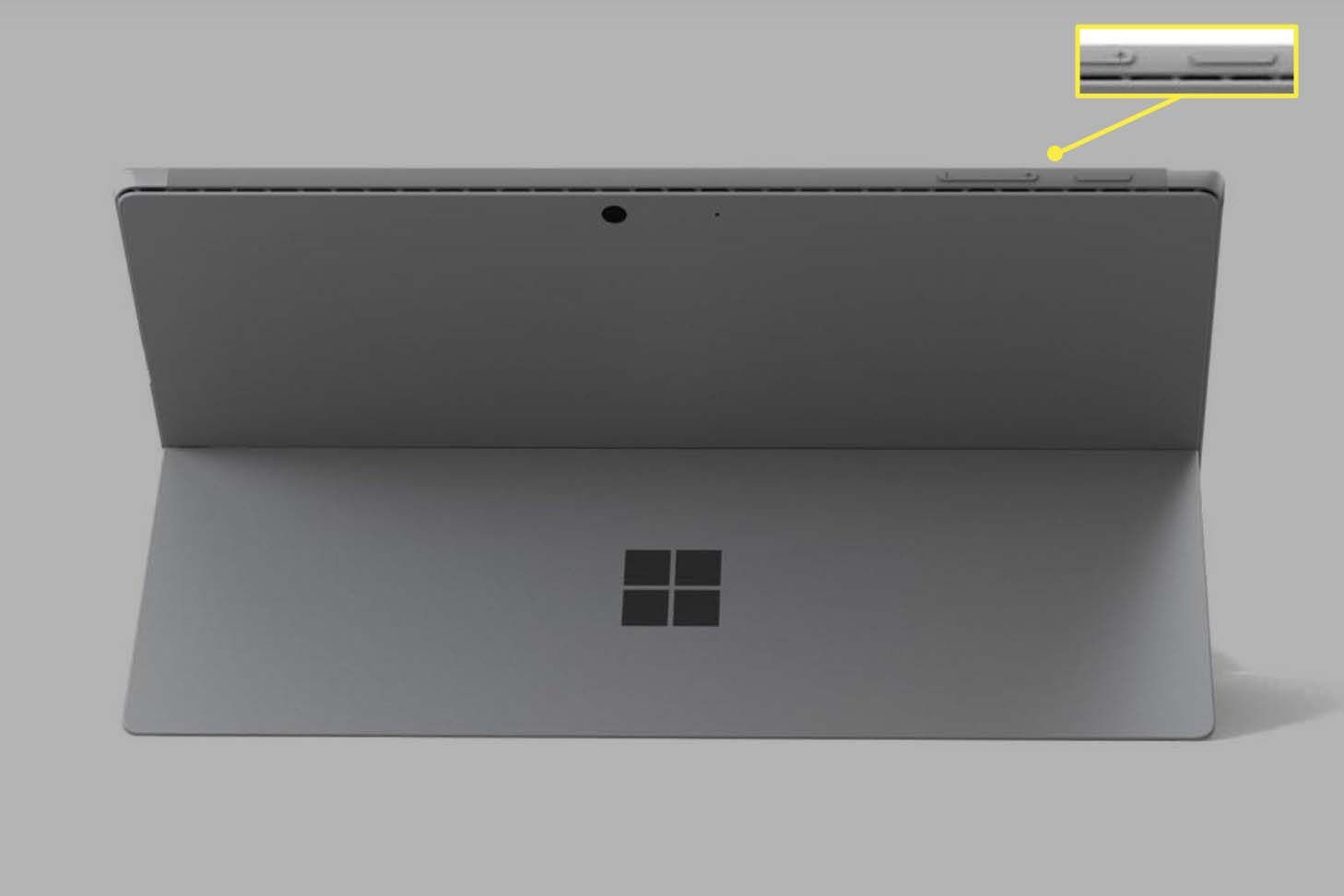En Microsoft Surface Pro som visas bakifrån med synliga knappar för ström och volym upp.