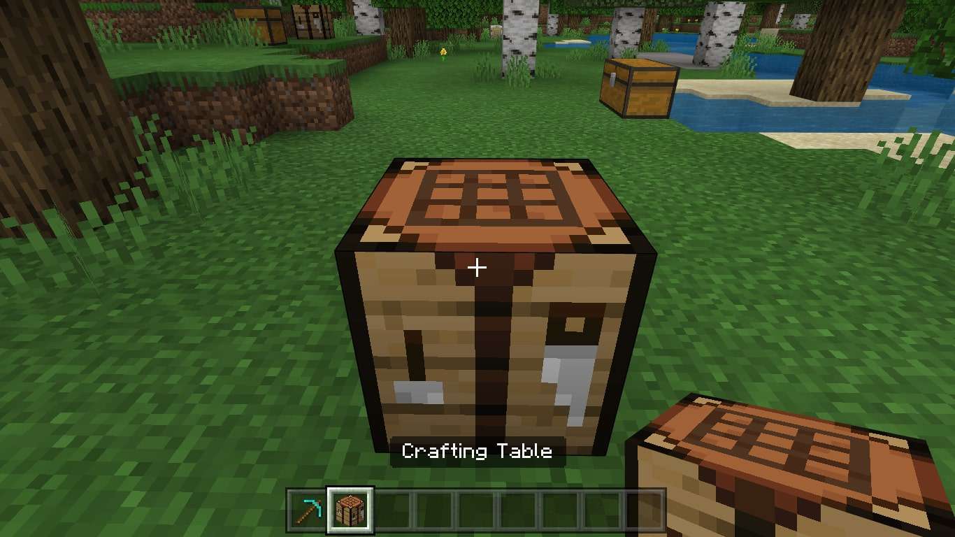 Ett hantverksbord på marken i Minecraft