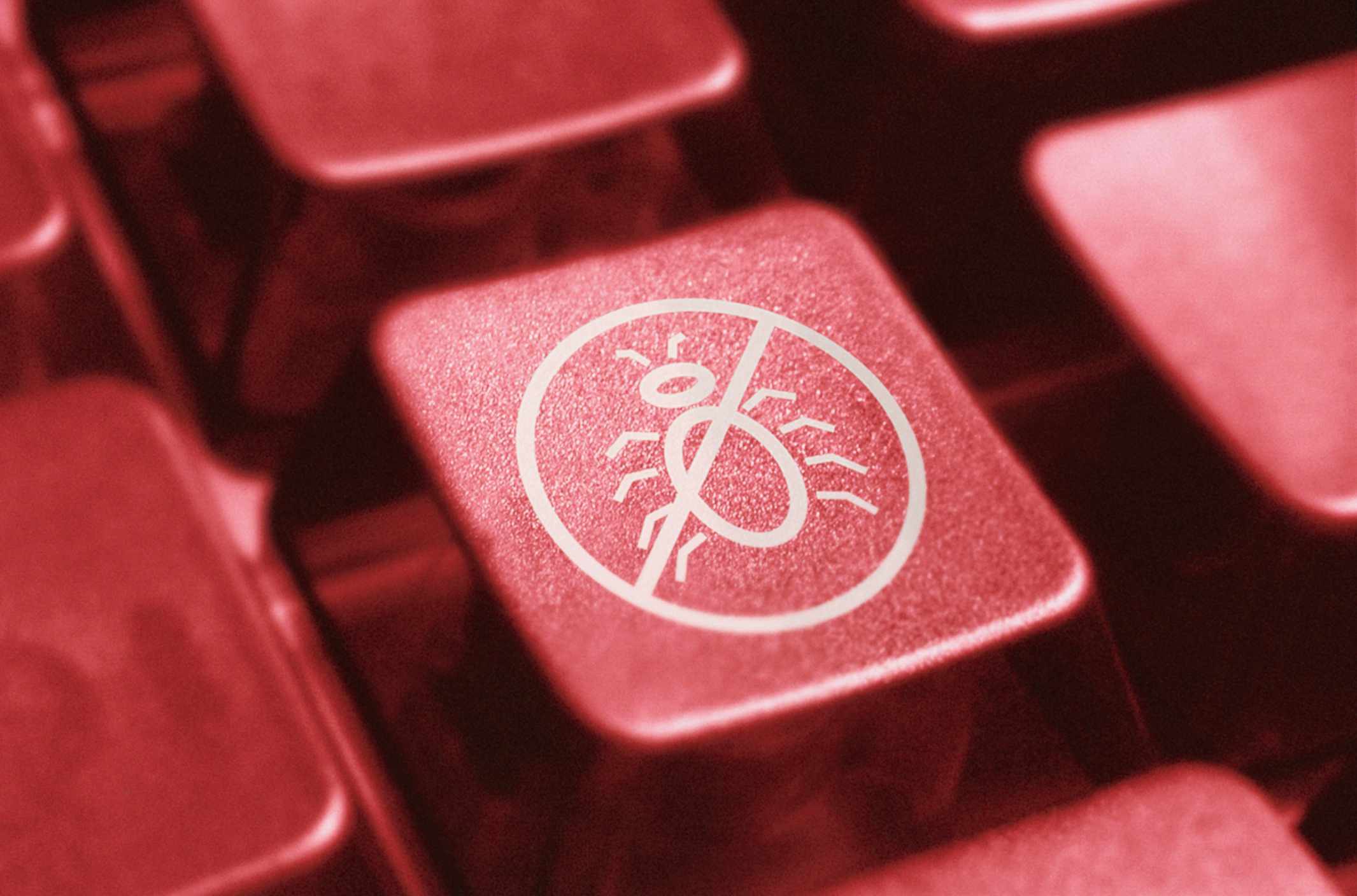 Foto av en virusindikeringstangent på ett datortangentbord