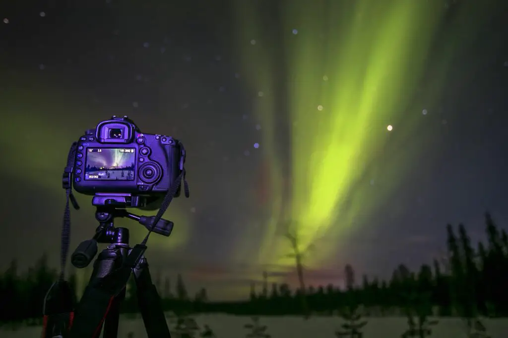 chasing the northern lights in sweden 558520863 5ae8d3543418c60037b52667