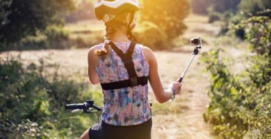 girl with helmet and a braid taking a selfie on a bicycle in a beautiful sunny day 825103938 5c4b7d6cc9e77c0001d75f98