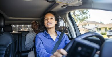 young black woman driving car for rideshare 1159637659 3590d274b993416a9f02eff08a16b48e