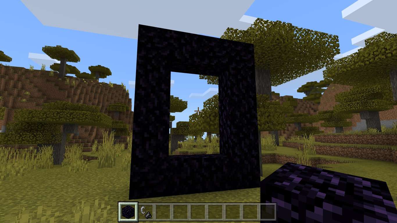 Placera två obsidianer mellan kanterna på de vertikala blocken för att ansluta ramen.