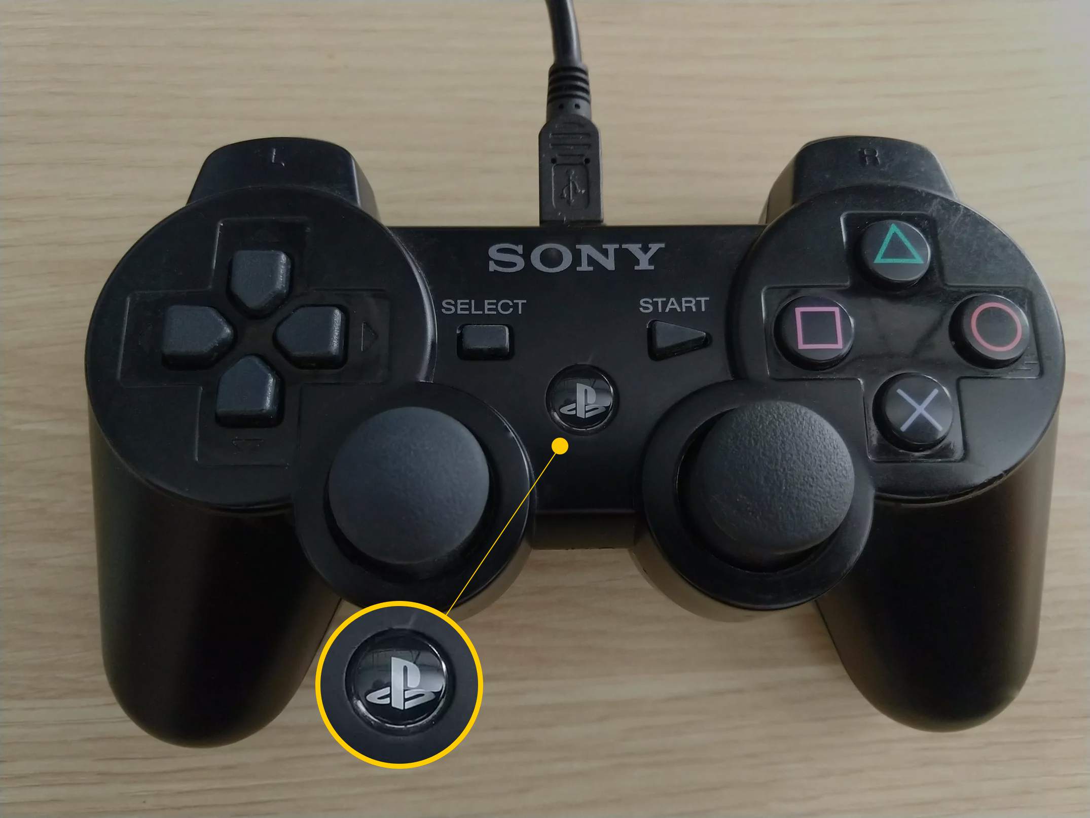 PS-knapp på PS3-kontrollenhet