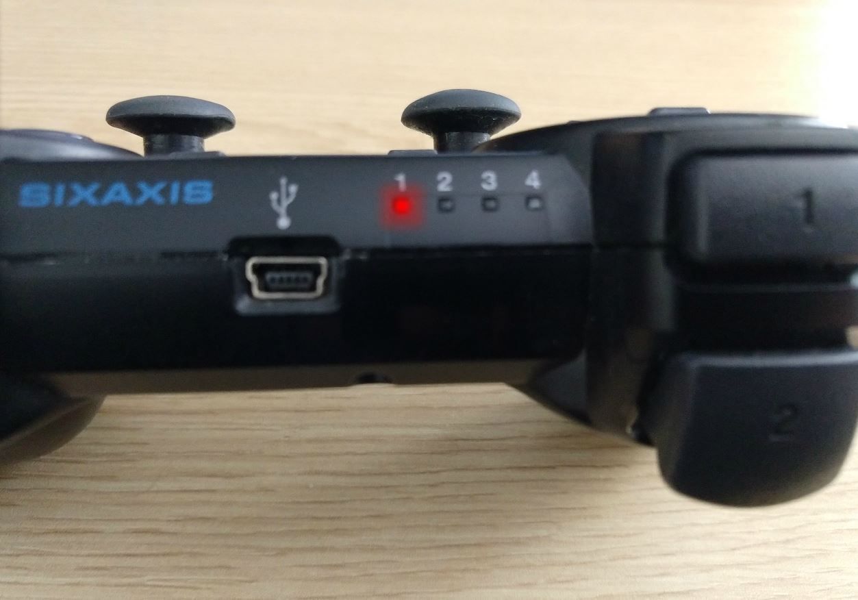 Synkroniseringslamporna visas på en PS3-kontroller