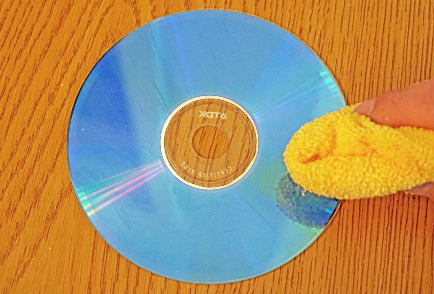Skrapad CD-torkning med tyg