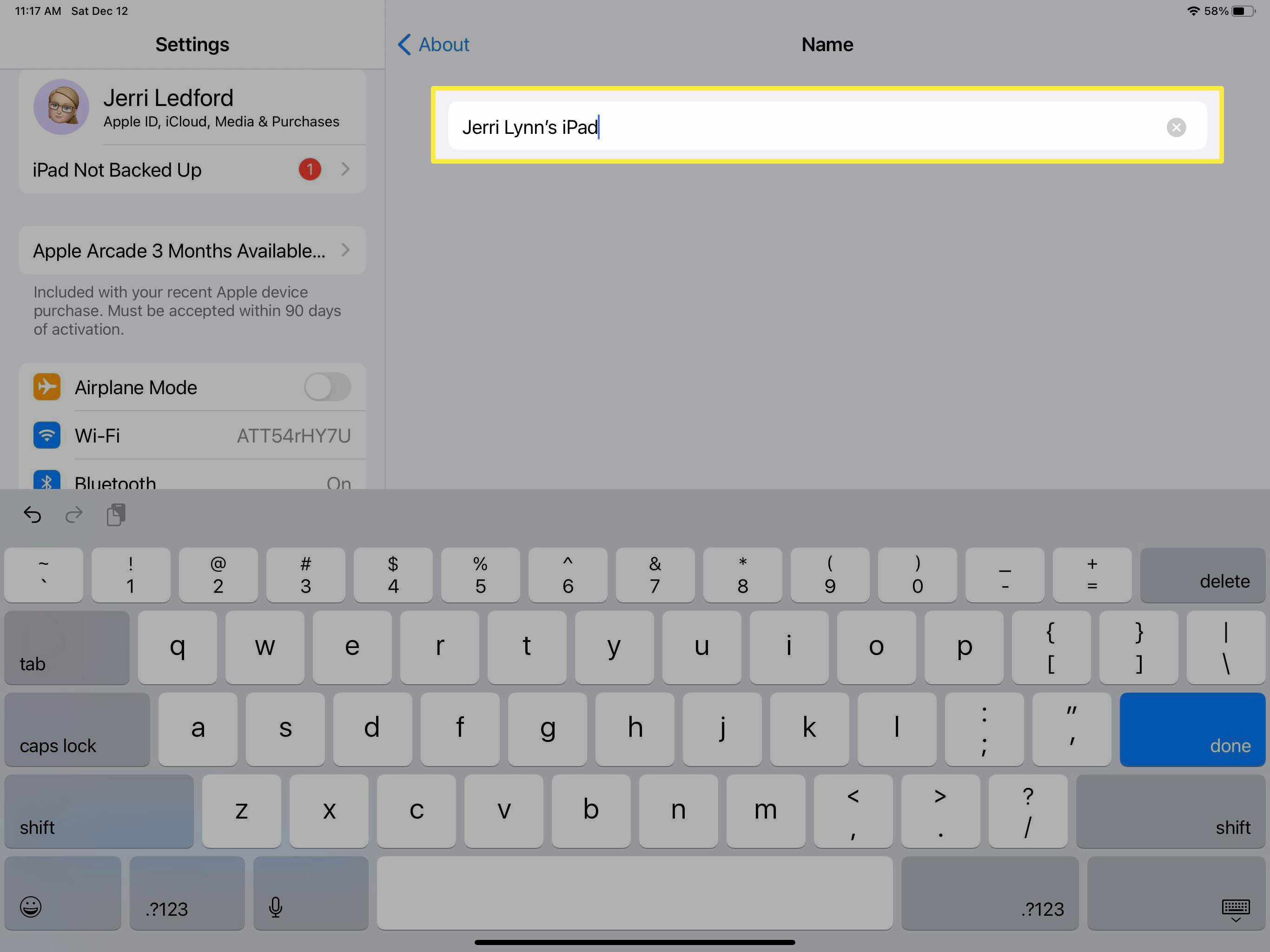 Skärmdump av textfältet Namn i inställningarna Om på iPad.