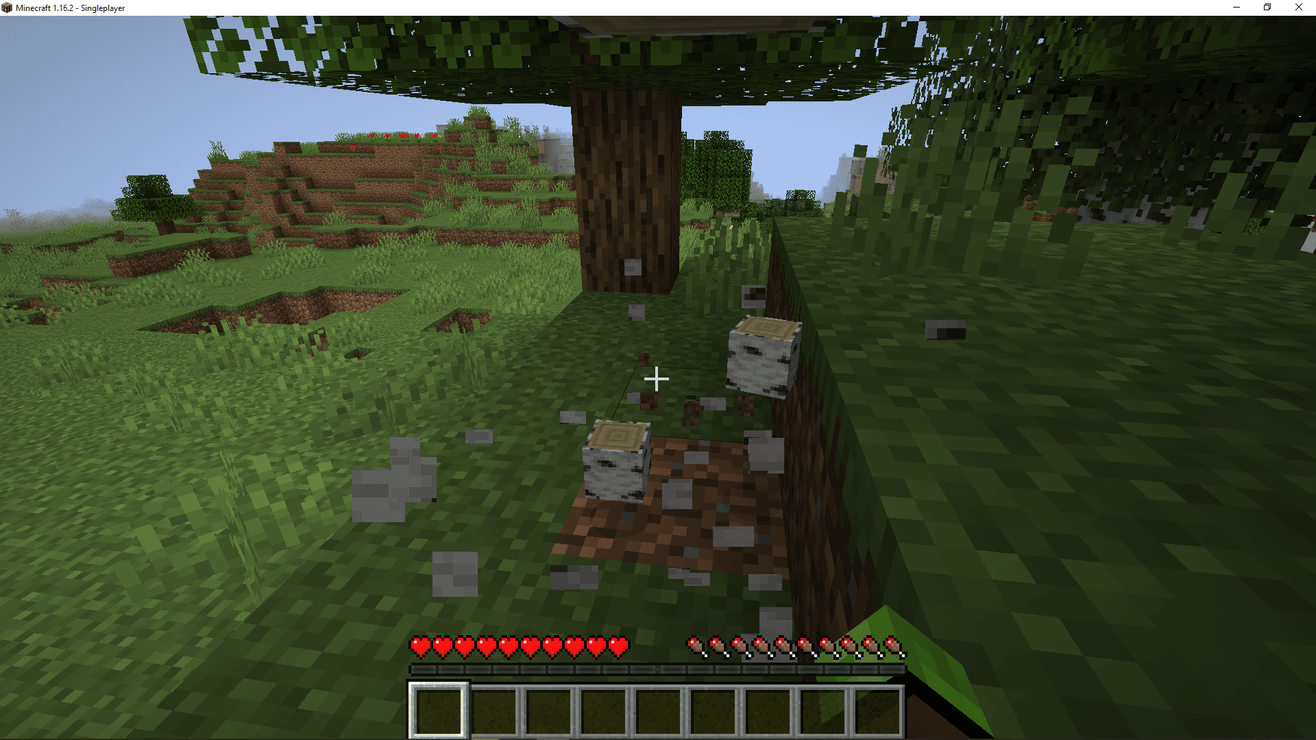 En skärmdump av stansning av träd i Minecraft.