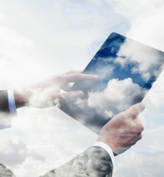 business man using tablet with clouds 162984071 5b0433a8ff1b780020be534e