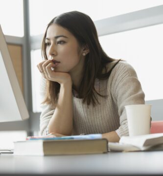 focused college student studying at computer 485207563 59af2b10b501e8001181b6b1