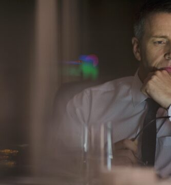 pensive businessman working late at laptop in office 500796897 5a84e2038e1b6e00367c08ca