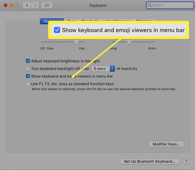 Visa tangentbords- och emoji -tittare i menyraden Systempreferens i macOS.