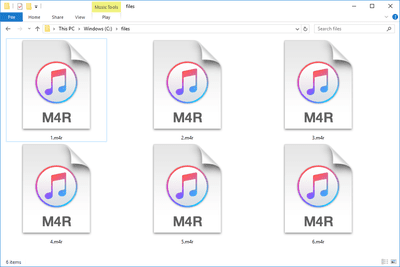 Skärmdump av flera M4R -filer i Windows 10 som öppnas med iTunes