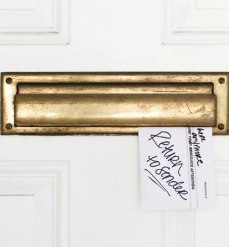 an envelope stuck in a mail slot with return to sender written on it 187591438 57cdceed3df78c71b65ce509